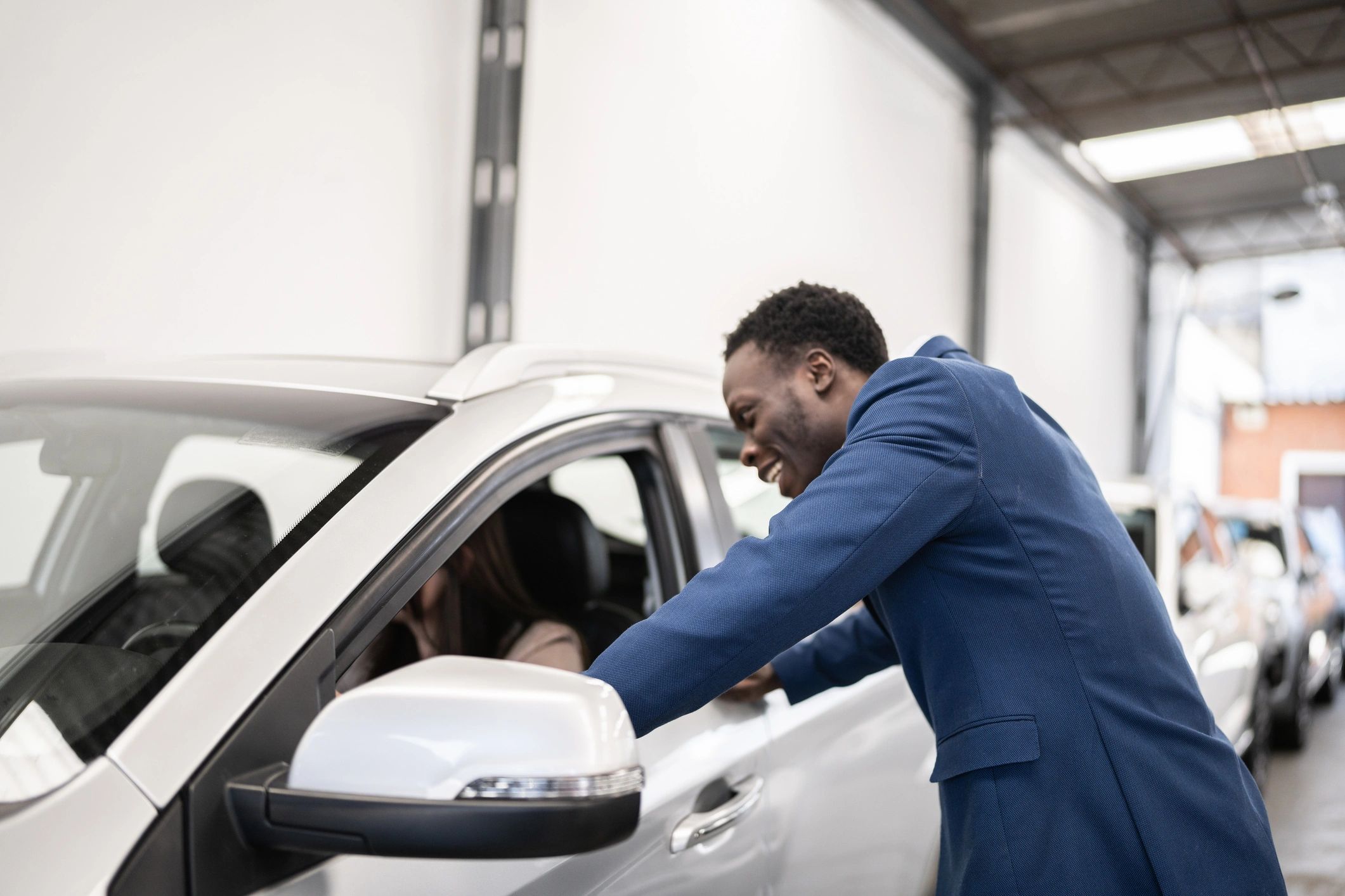 Customer discussing vehicle service at a service counter