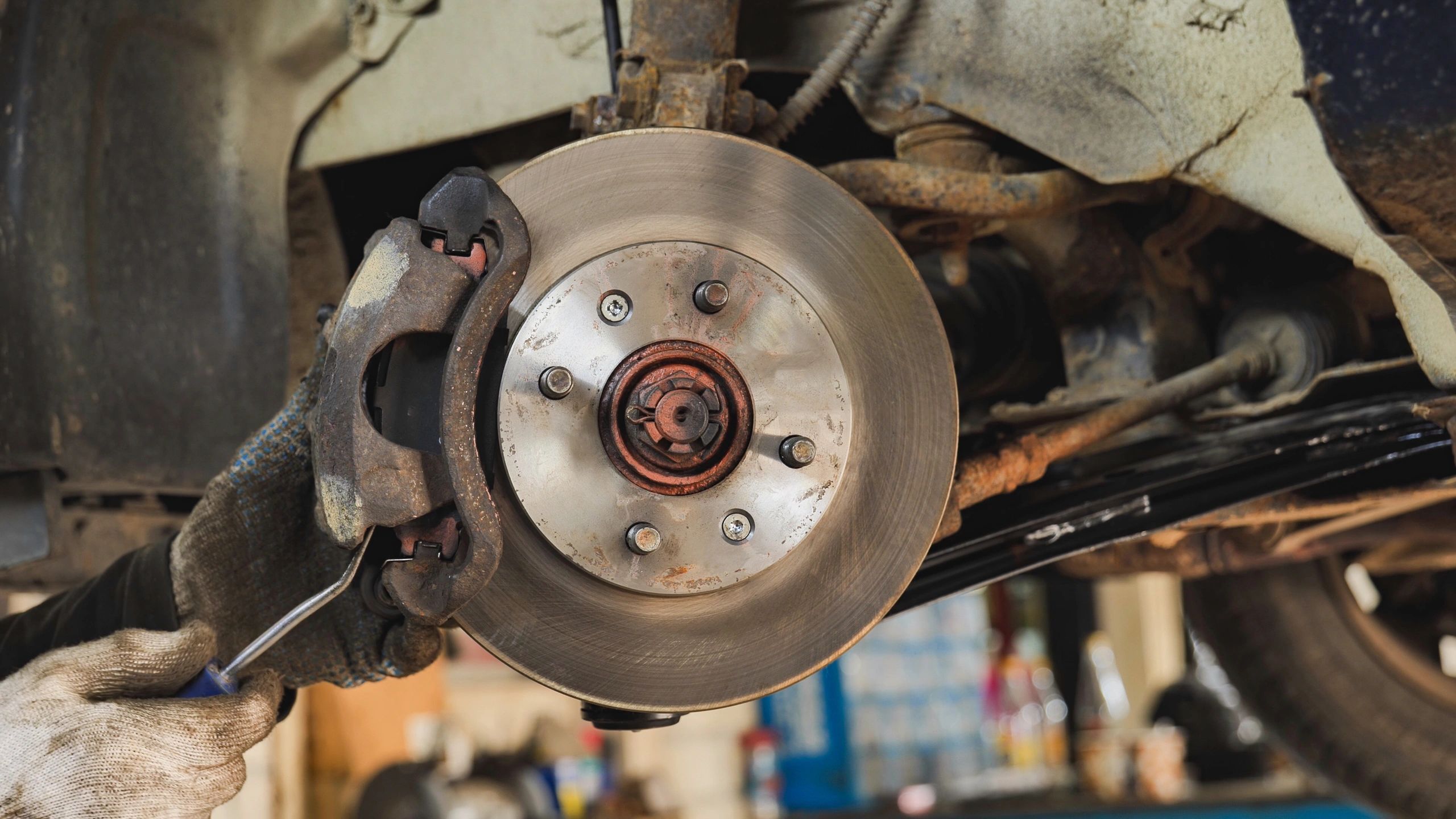 Mechanic servicing a brake system